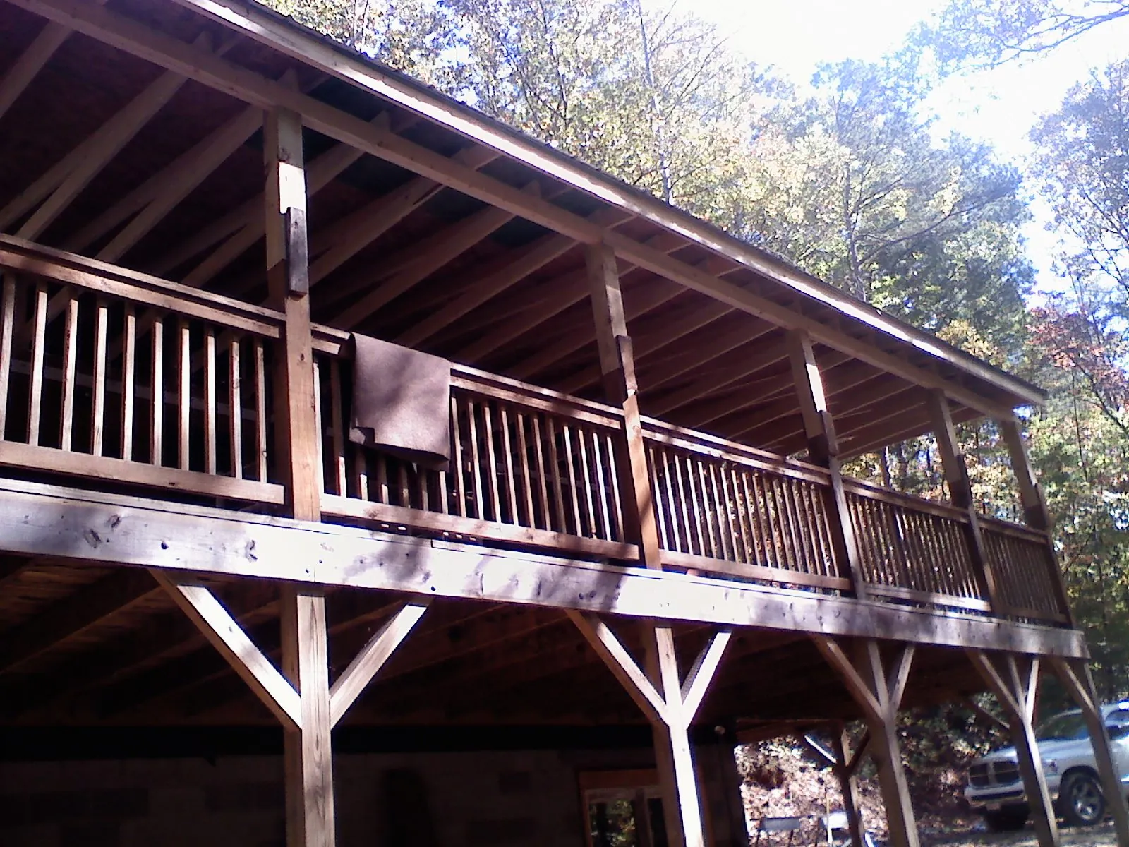 Timber framing under a new elevated porch and deck — Roof Leak Repair in Mabank by Roofing Brothers